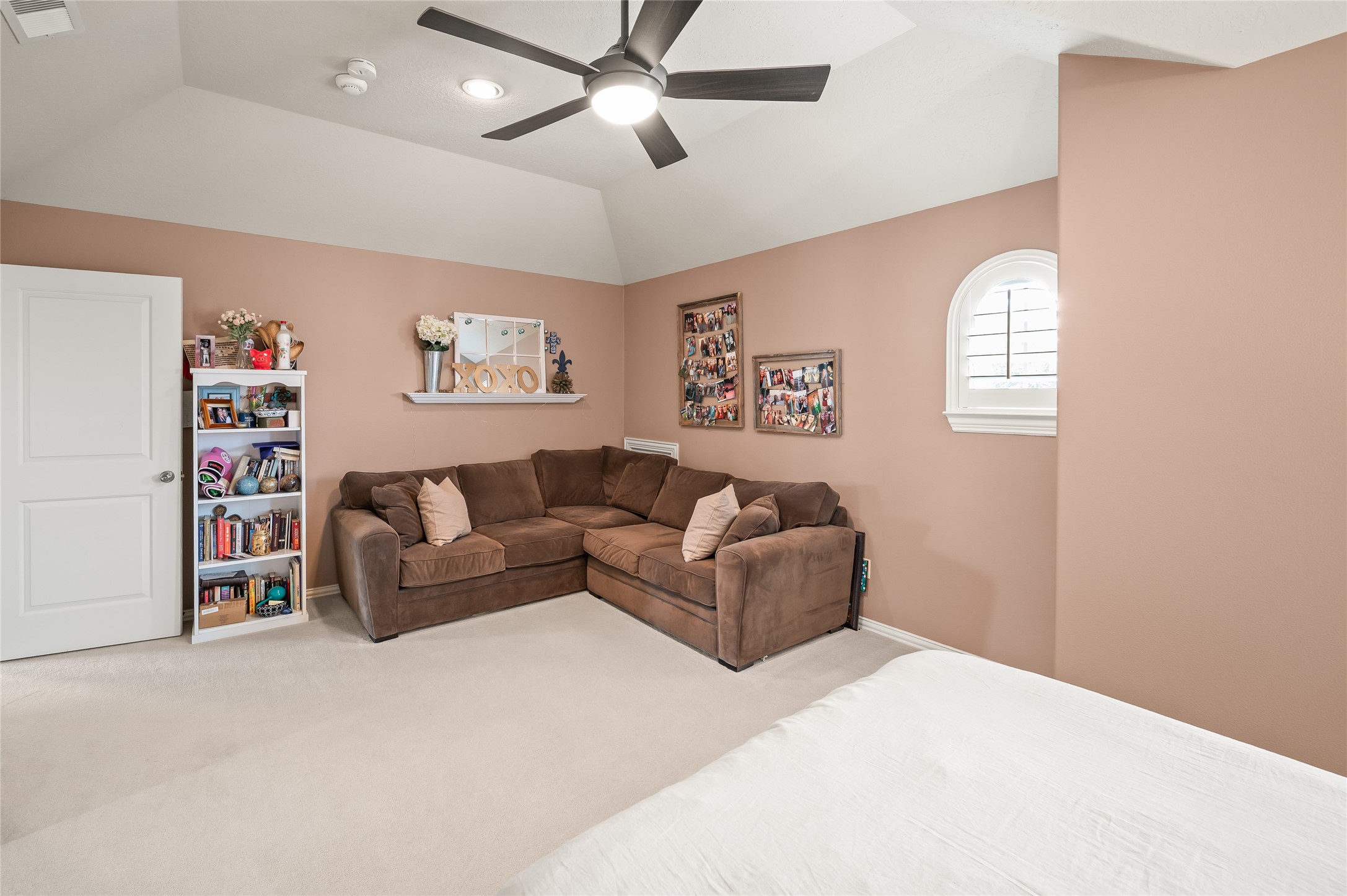 2127 Thicket Ridge Lane Houston, TX 77077 - Photo 27 of 48 The L-shaped couch easily fits into this oversized bedroom. It is great area for reading, watching TV or just relaxing.