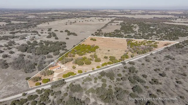 an aerial view of beach and ocean