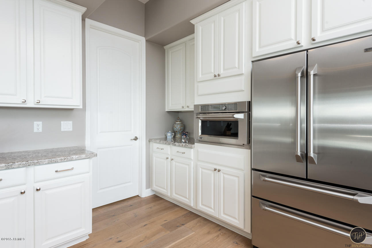 5627 East Sleepy Ranch Road Cave Creek, AZ 85331 - Photo 12 of 38 kitchen cabinets.jpg