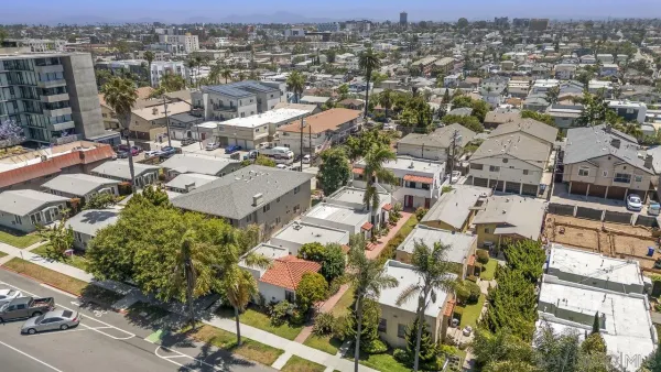 an aerial view of a city with lots of residential buildings