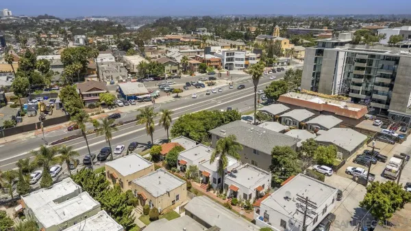 an aerial view of a city with lots of residential buildings