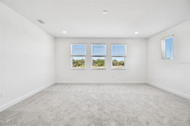 a view of a bathroom from the hallway
