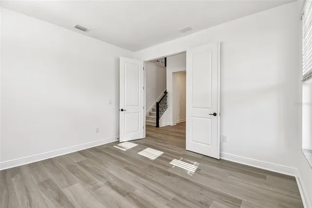 an empty room with windows