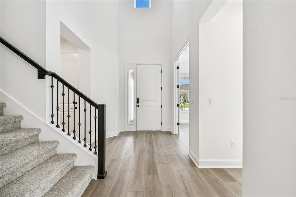 3677 142nd Terrace Parrish, FL 34219 - Photo 67 of 93 a view of an entryway with wooden floor