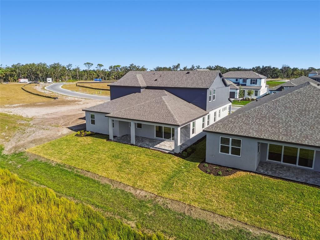 3677 142nd Terrace Parrish, FL 34219 - Photo 91 of 93 a aerial view of a house with a ocean view