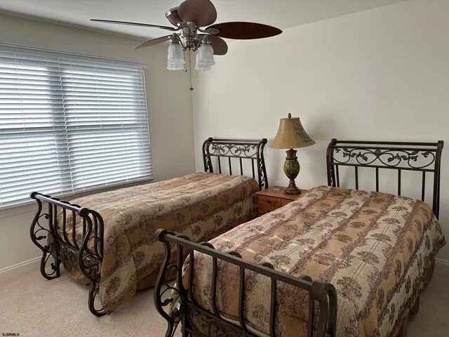 a view of a balcony with wooden floor