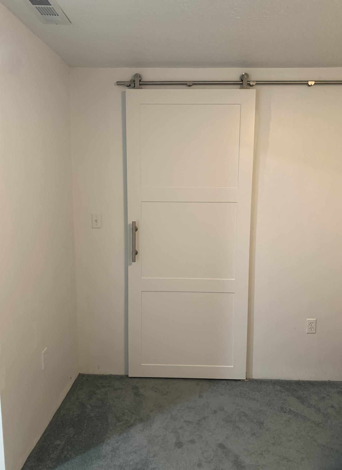 120 Key Honey Road Tavernier, FL 33070 - Photo 19 of 28 Barn Door to Main Bedroom Closet