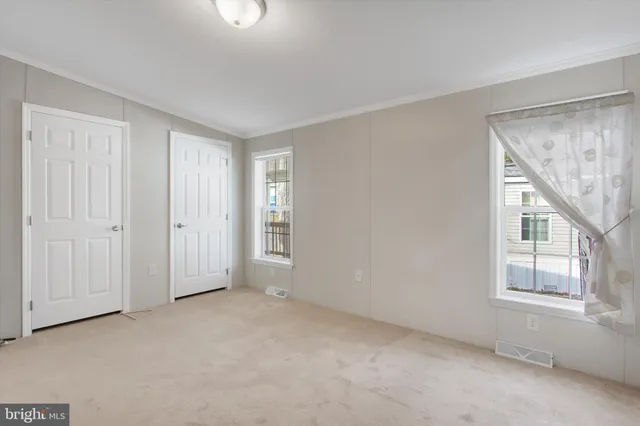 an empty room with windows