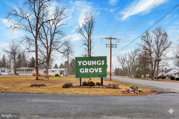 a sign that is on the side of a road