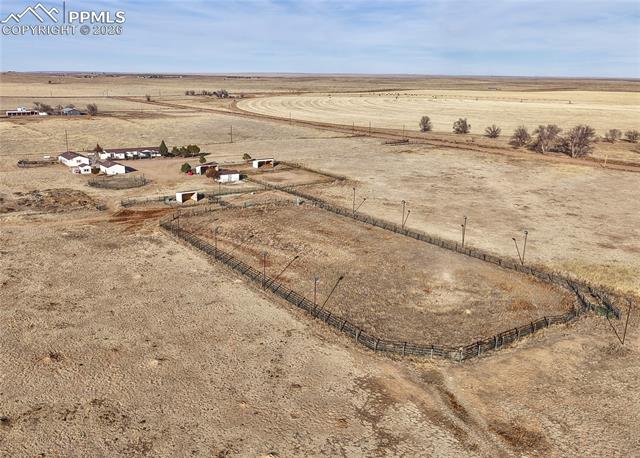 16830 Finch Road Colorado Springs, CO 80928 - Photo 45 of 49 HUGE lighted riding arena with gates, chutes, cross-fenced pens, a loafing shed, and access to several of the pastures