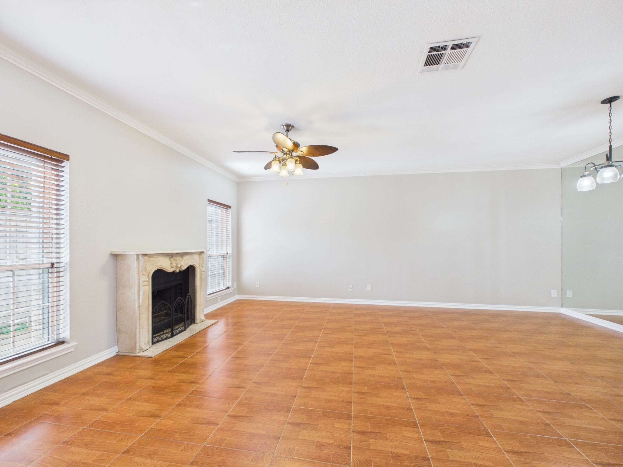 4001 Tanglewilde Street, Unit 709 Houston, TX 77063 - Photo 2 of 23 Open-concept living room with a warm and welcoming feel