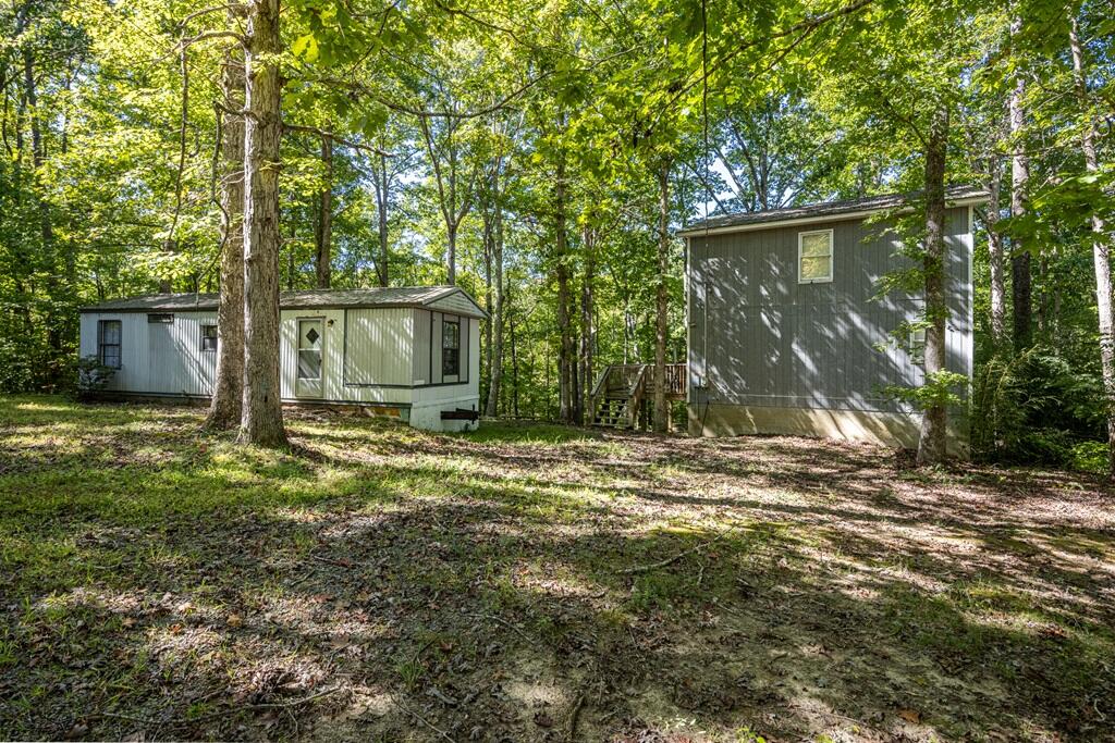 14 Riverview Avenue Buffalo Junction, VA 24529 - Photo 1 of 53 a backyard of a house with lots of green space