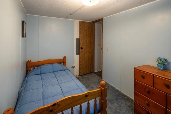 a view of a bedroom with toys