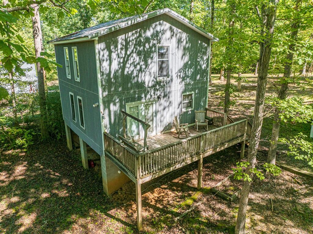 14 Riverview Avenue Buffalo Junction, VA 24529 - Photo 5 of 53 a yellow house with trees in front of it