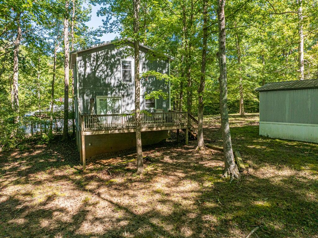 14 Riverview Avenue Buffalo Junction, VA 24529 - Photo 7 of 53 a view of a wooden house with a yard