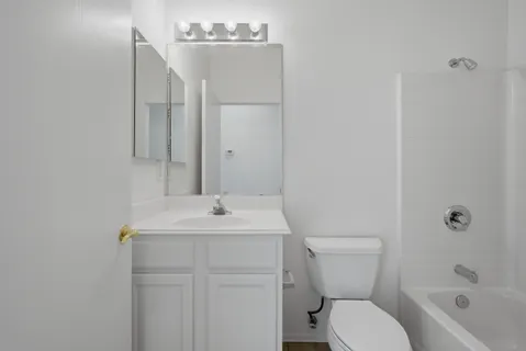 a house in middle of green field