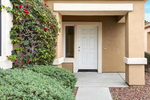 a view of empty room with windows