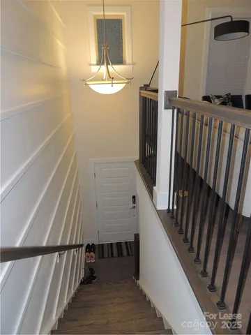 a view of balcony with wooden floor