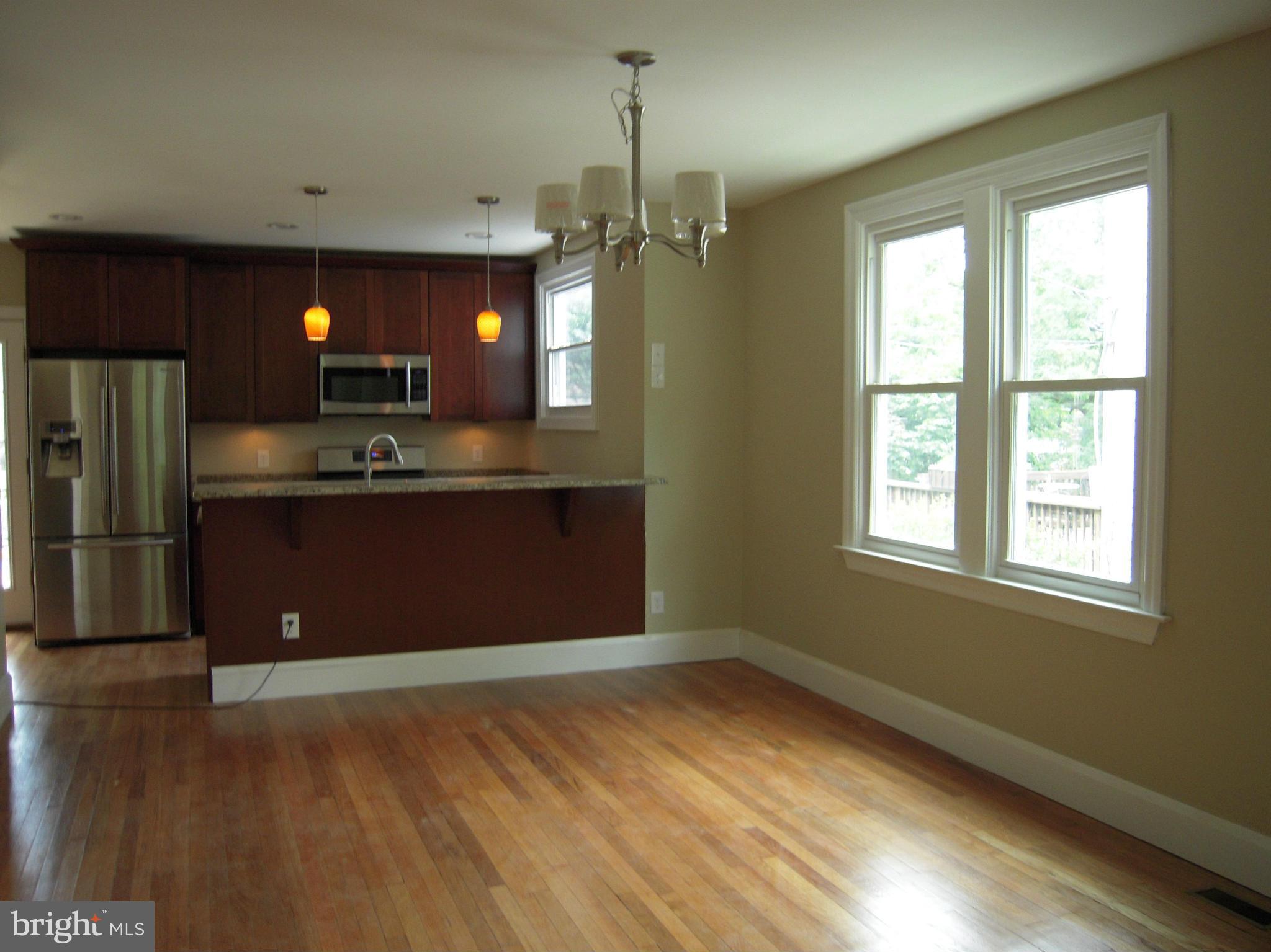 702 Anneslie Road Baltimore, MD 21212 - Photo 2 of 9 Dining Room Opens to Kitchen & Living Room