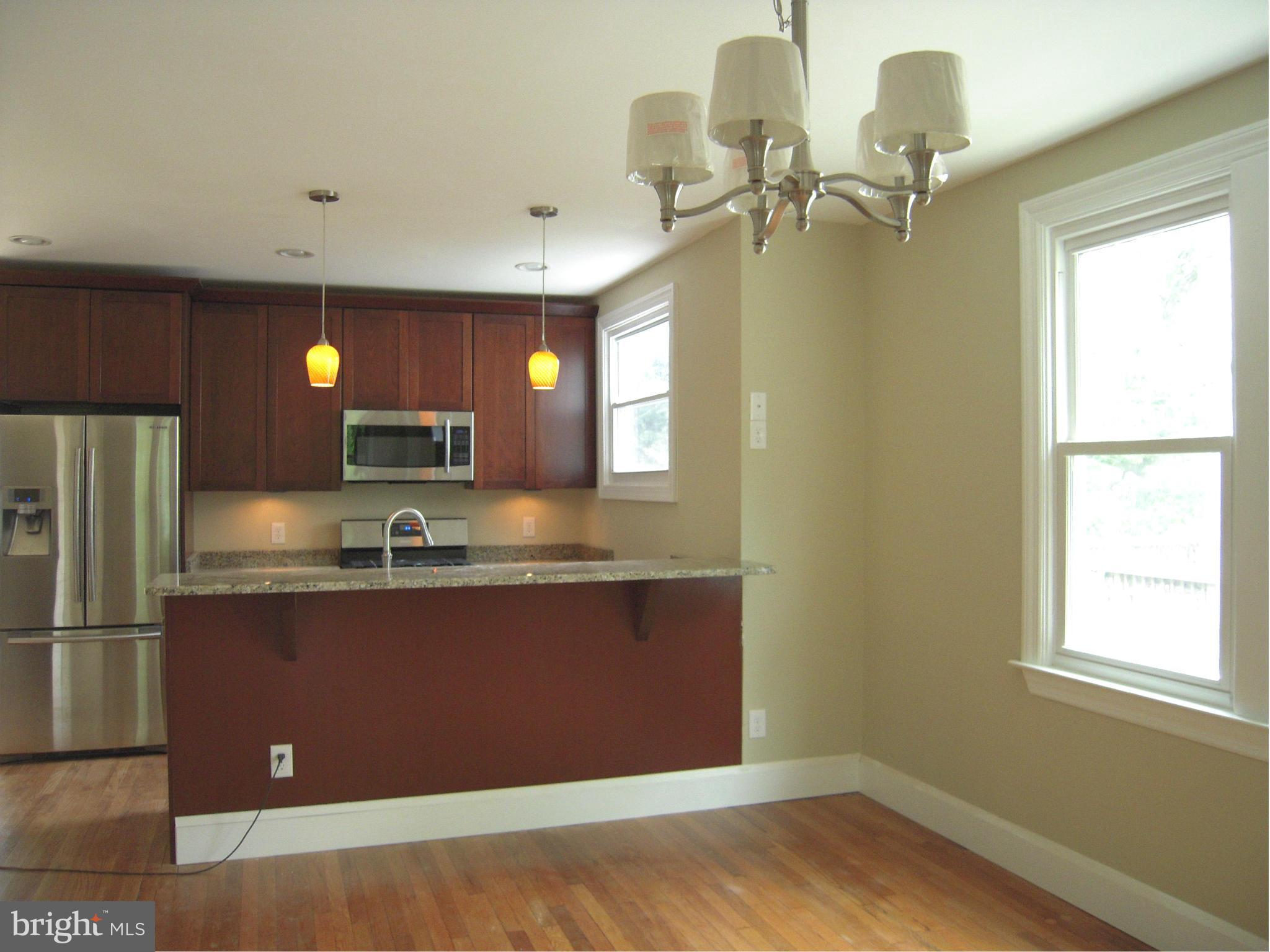 702 Anneslie Road Baltimore, MD 21212 - Photo 4 of 9 Dining Room Open to Kitchen Area
