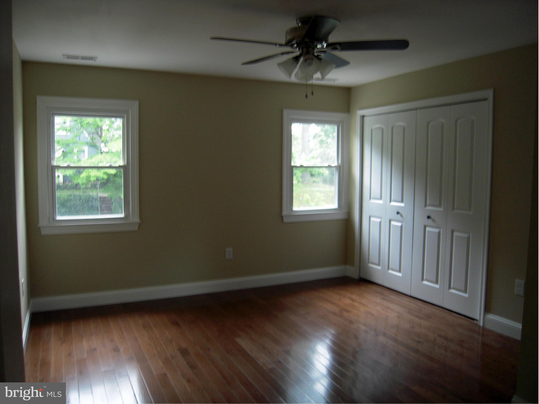 702 Anneslie Road Baltimore, MD 21212 - Photo 5 of 9 Master Bedroom w/ Bath and Wood Floors