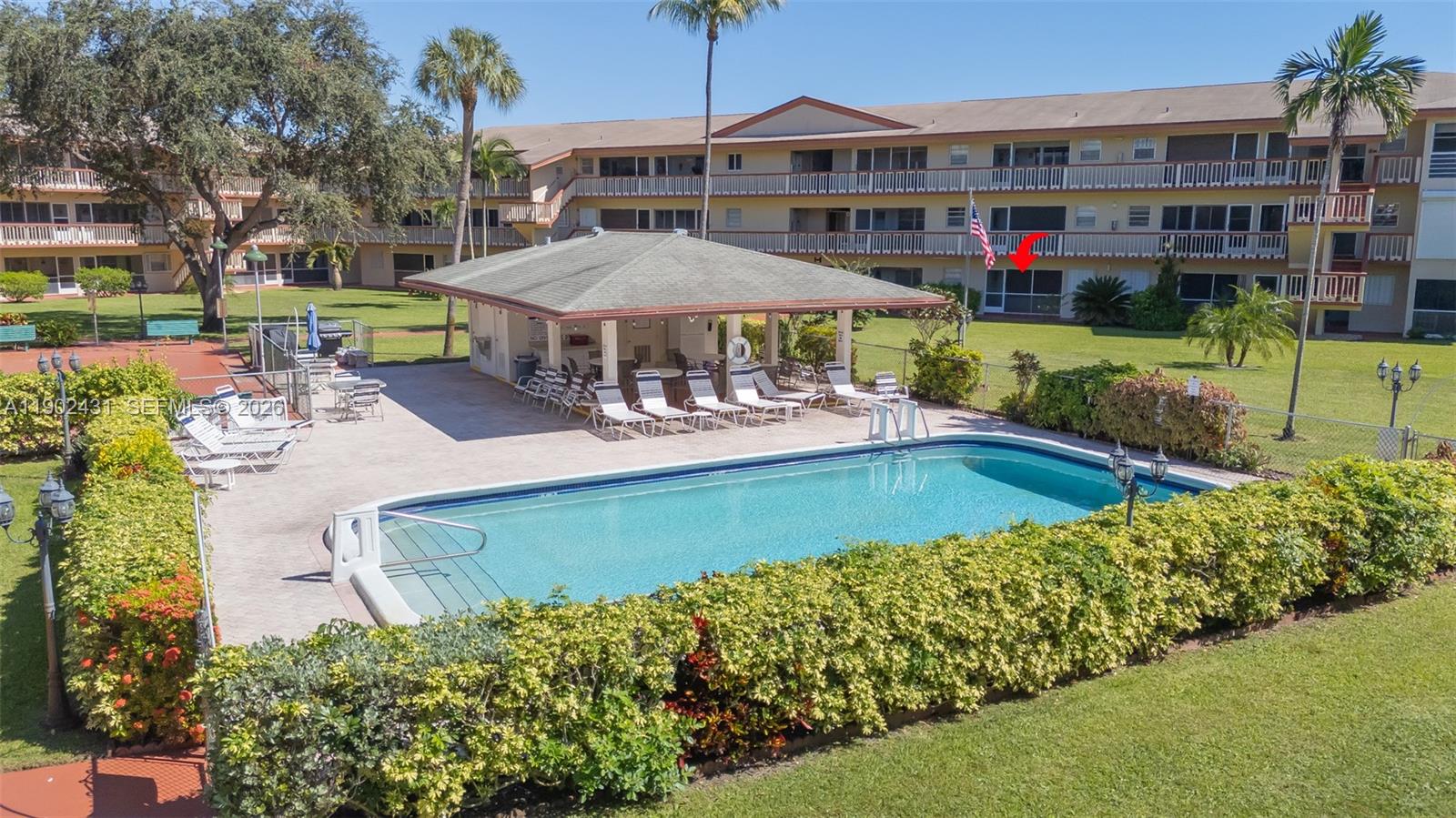 5300 Washington Street, Unit H137 Hollywood, FL 33021 - Photo 5 of 30 a view of a house with garden and sitting area