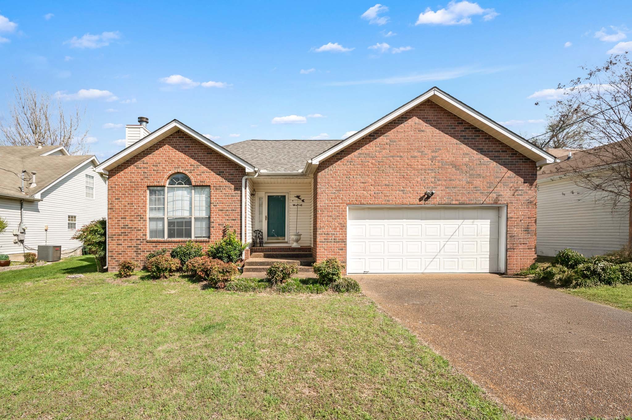 3624 Burwick Place Antioch, TN 37013 - Photo 1 of 31 a front view of a house with a yard