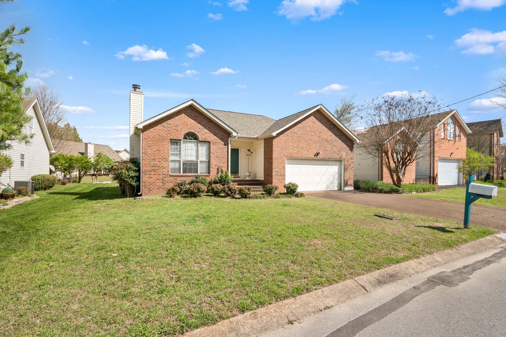 3624 Burwick Place Antioch, TN 37013 - Photo 2 of 31 a front view of a house with garden