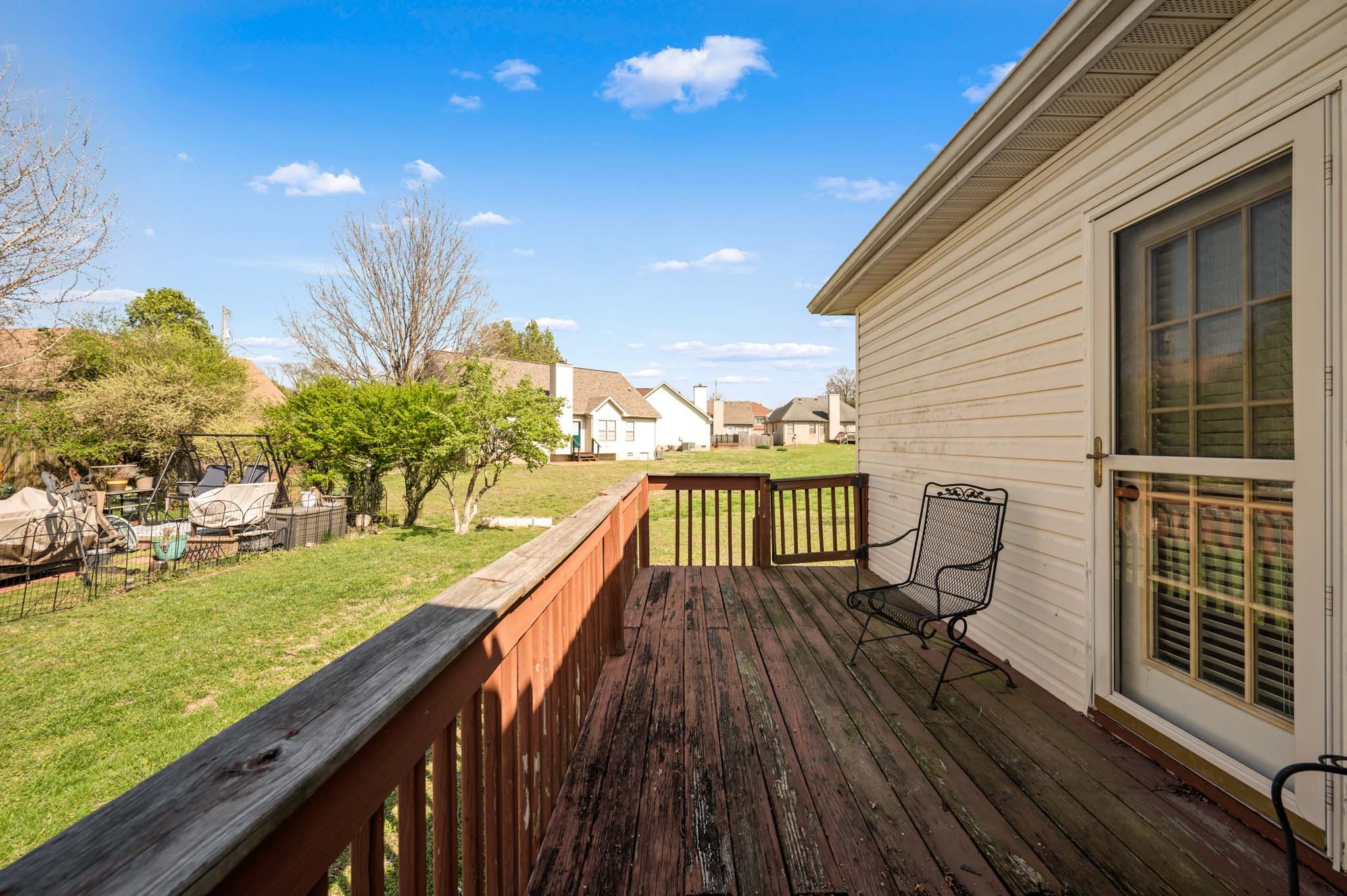 3624 Burwick Place Antioch, TN 37013 - Photo 26 of 31 a view of a balcony with chair and wooden floor