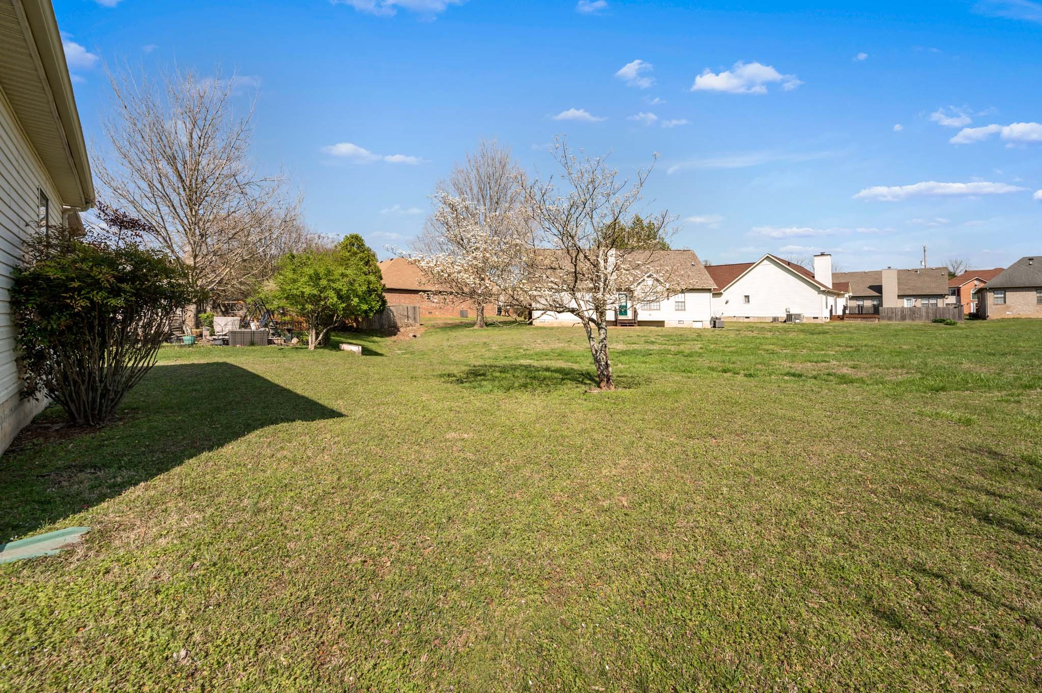 3624 Burwick Place Antioch, TN 37013 - Photo 30 of 31 a view of a big yard with a house in the background