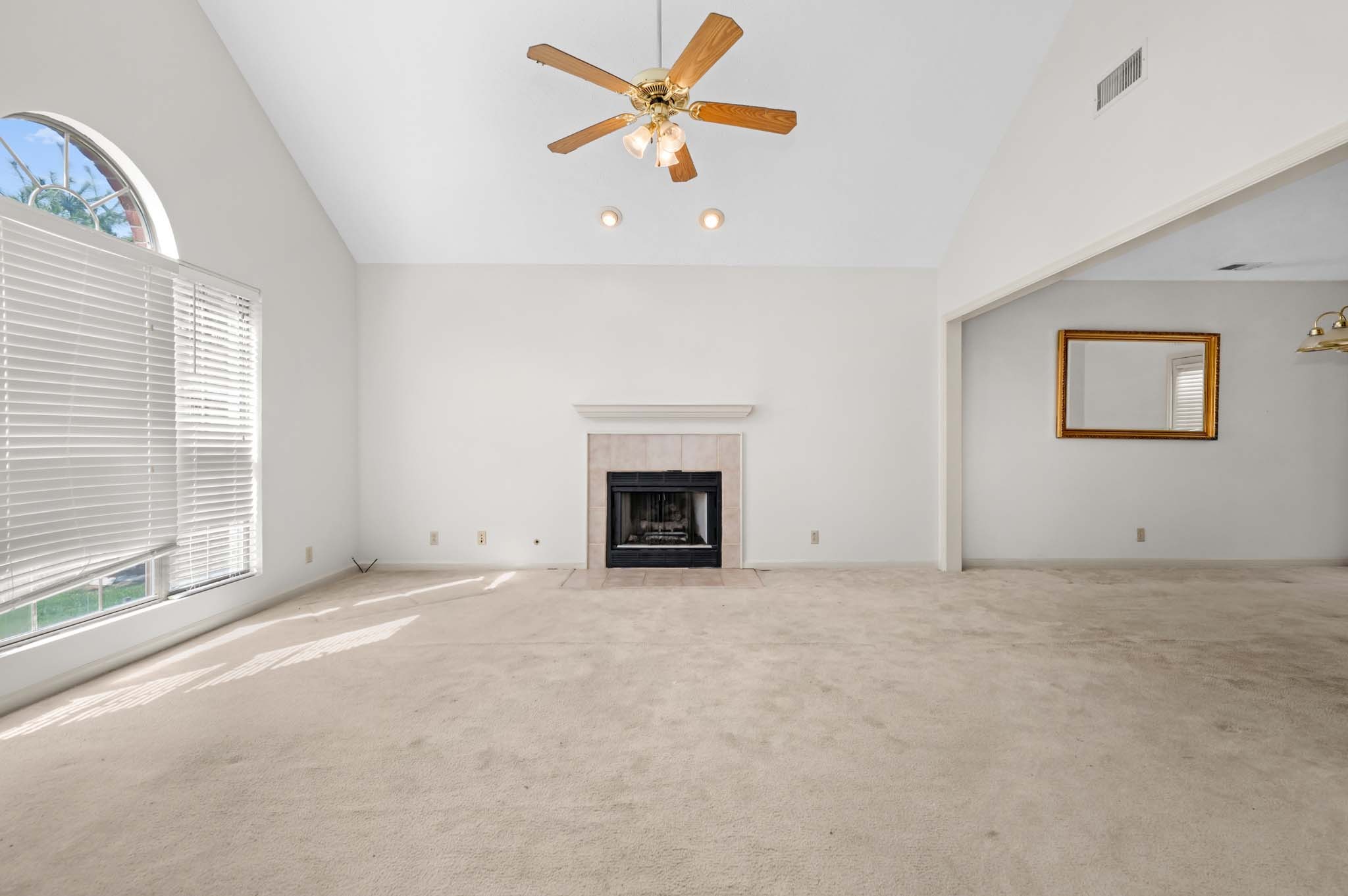 3624 Burwick Place Antioch, TN 37013 - Photo 7 of 31 an empty room with windows and fireplace