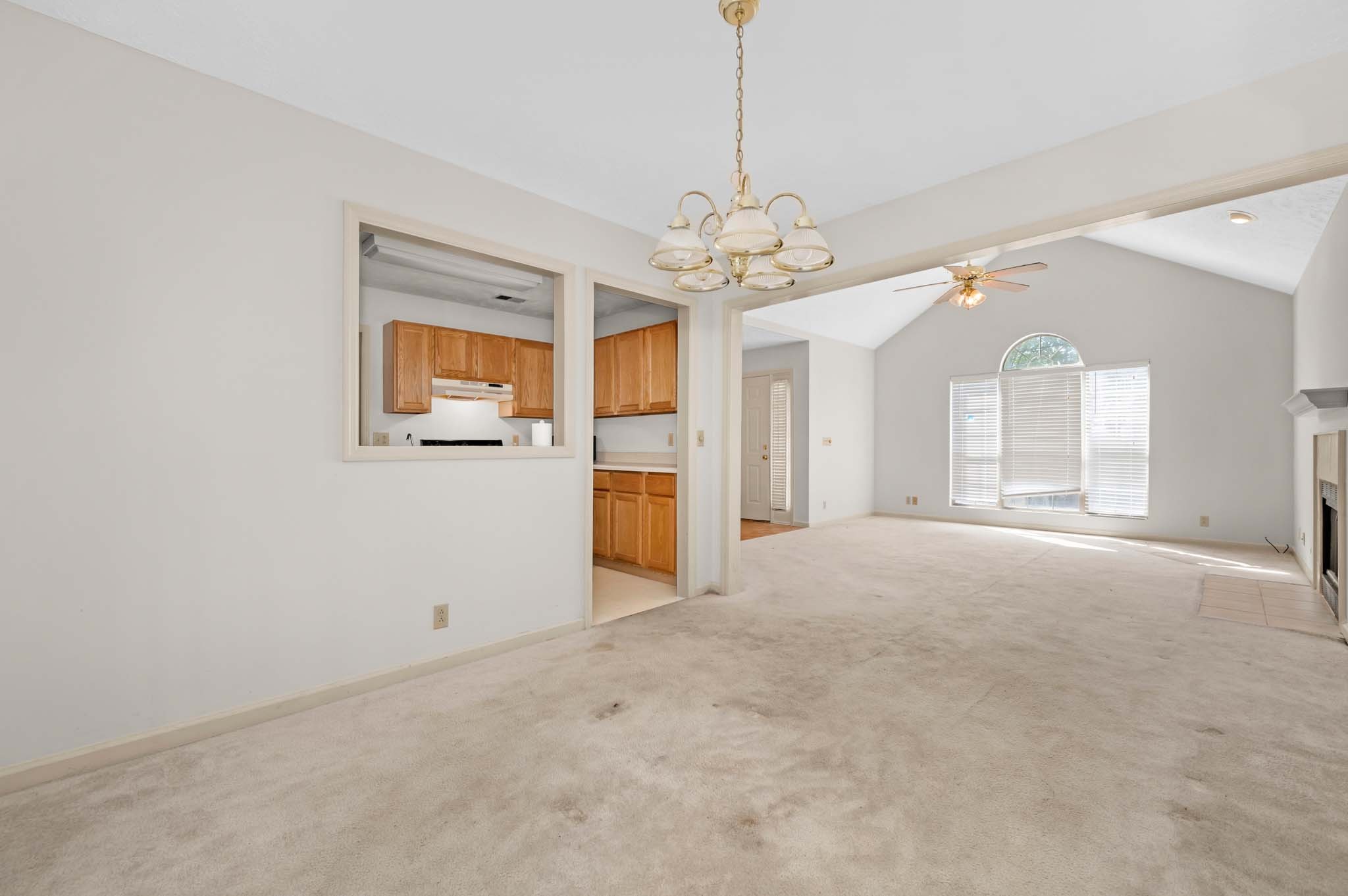 3624 Burwick Place Antioch, TN 37013 - Photo 10 of 31 a view of a livingroom with a chandelier fan and windows