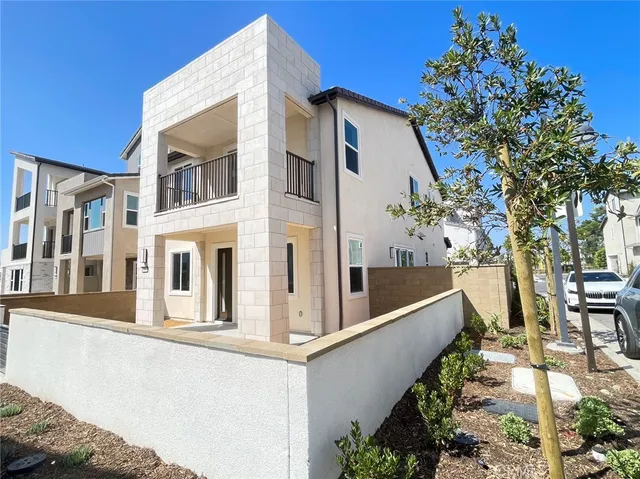 a house with trees in front of it
