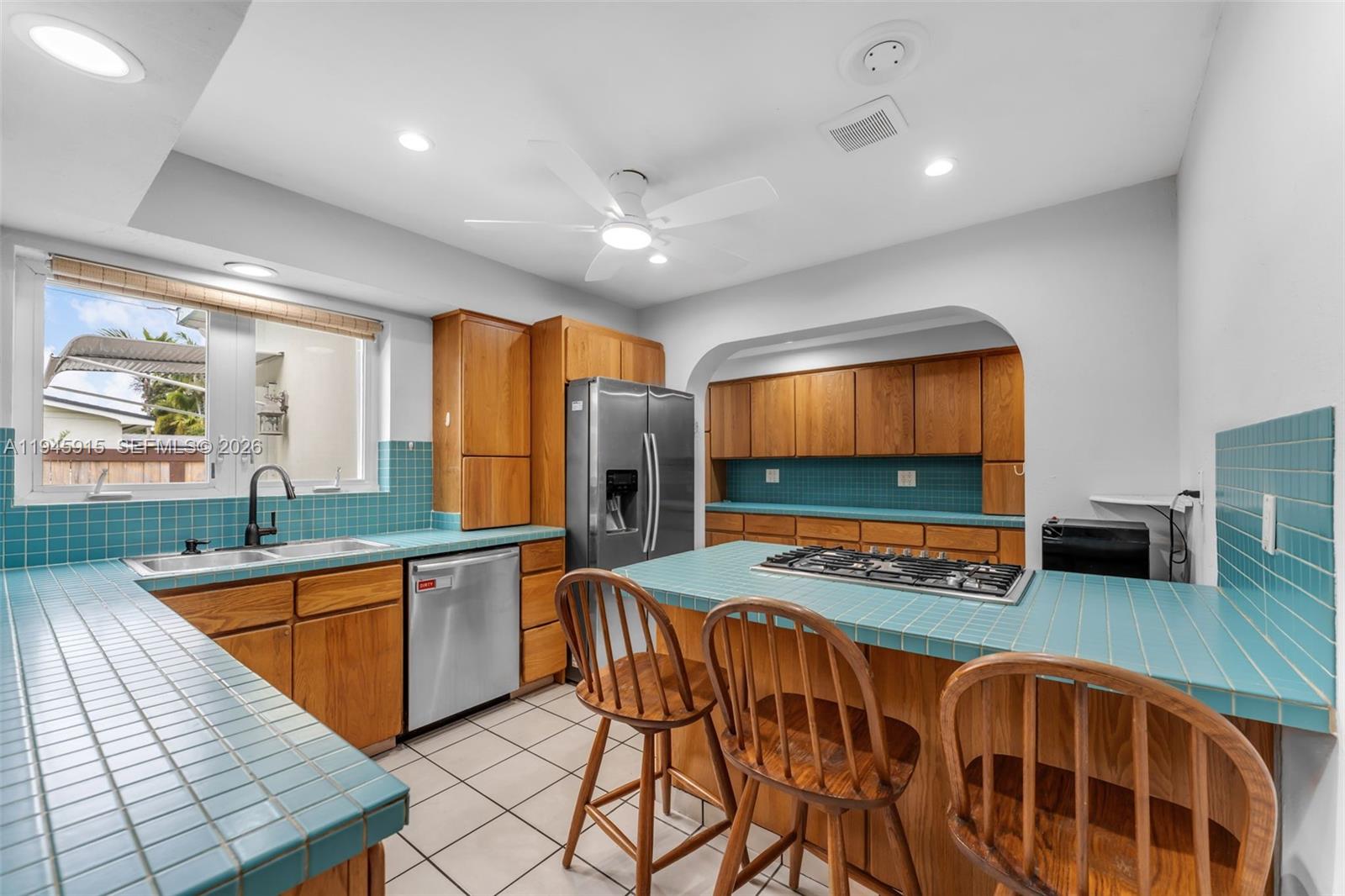 8760 Southwest 191st Street Cutler Bay, FL 33157 - Photo 15 of 46 WITH COOKING PENINSULA