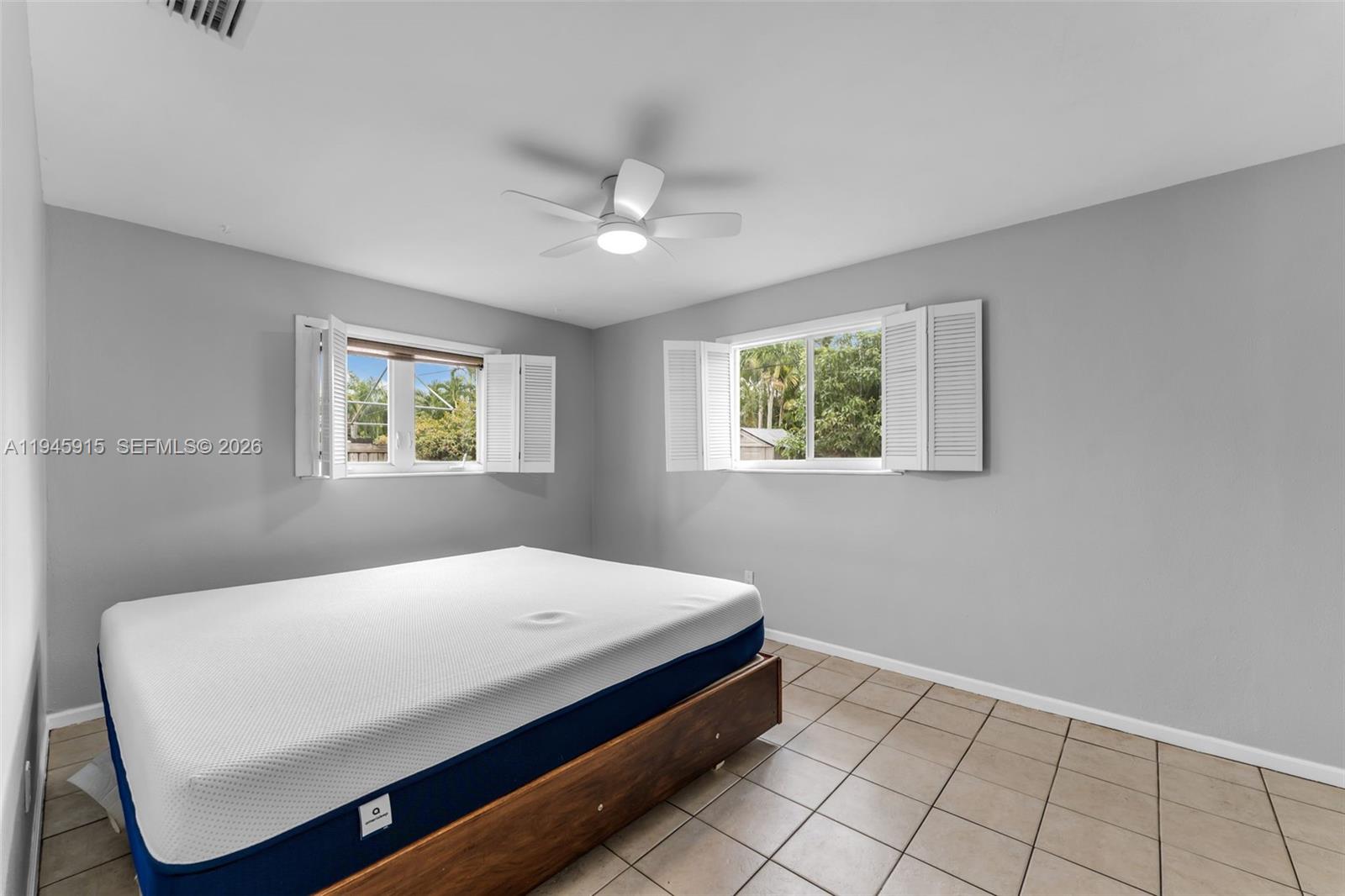 8760 Southwest 191st Street Cutler Bay, FL 33157 - Photo 22 of 46 BEDROOM EASILY FITS KING SIZE BED WITH DRESSERS AND NIGHT STANDS