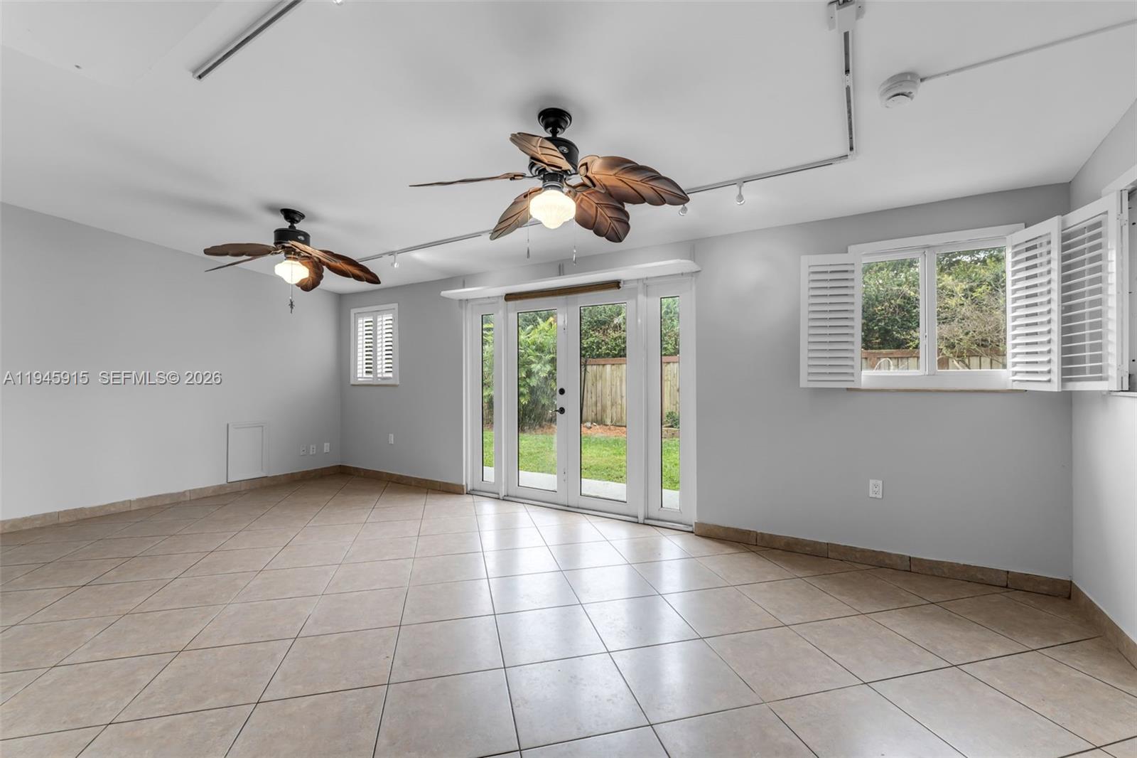 8760 Southwest 191st Street Cutler Bay, FL 33157 - Photo 8 of 46 SUNROOM, OFFICE, OR EXTRA LIVING SPACE