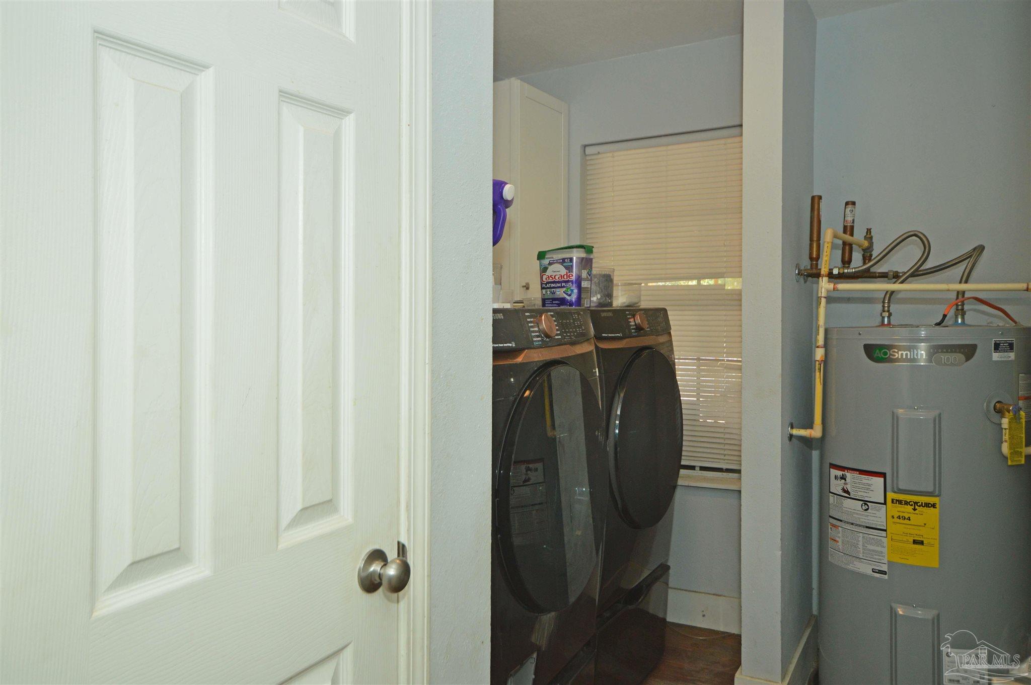 4163 Woodville Road Milton, FL 32583 - Photo 32 of 35 a view of walk in closet