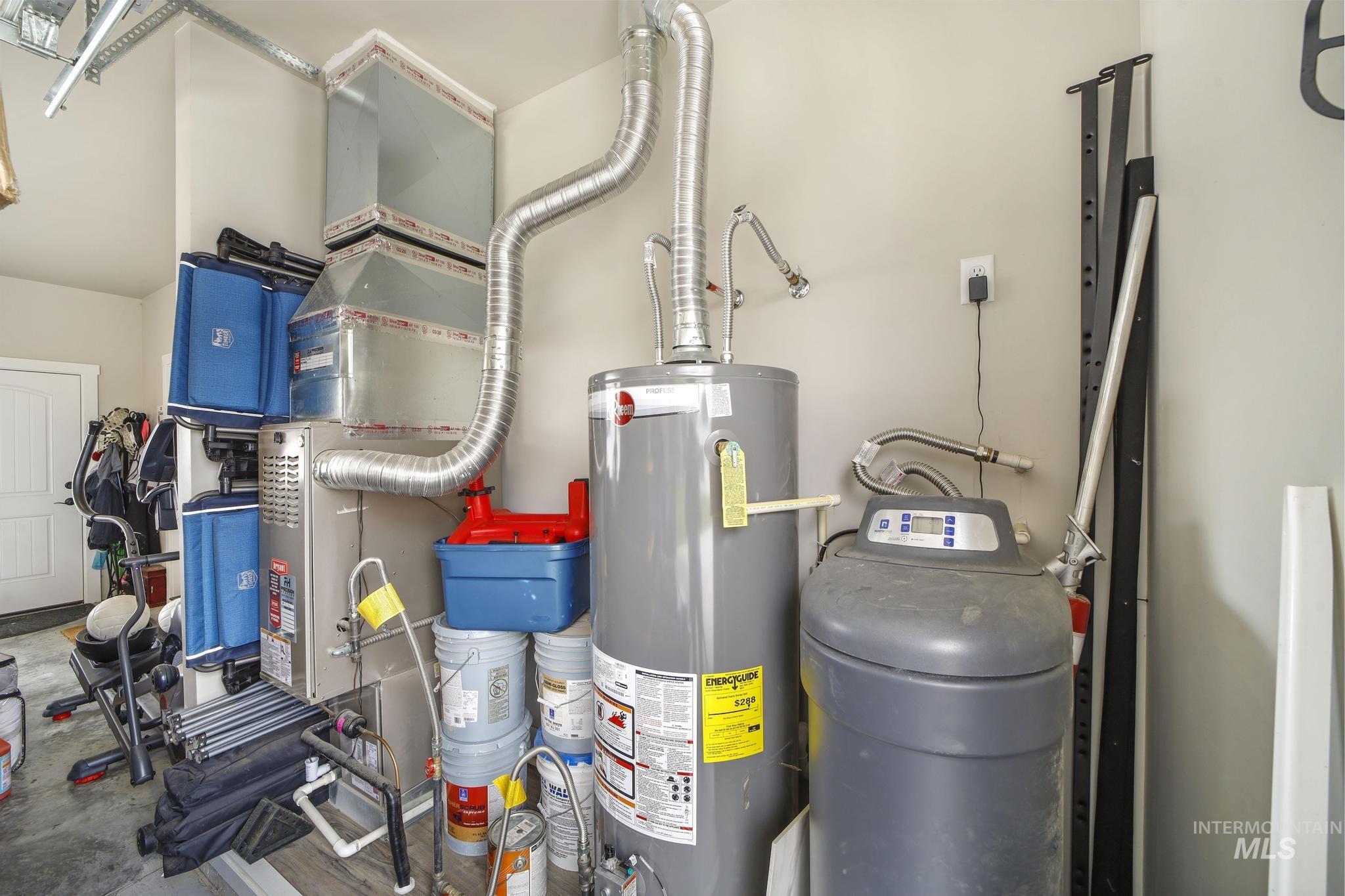 284 Sandi Road Twin Falls, ID 83301 - Photo 18 of 22 Utility room with water heater and heating unit