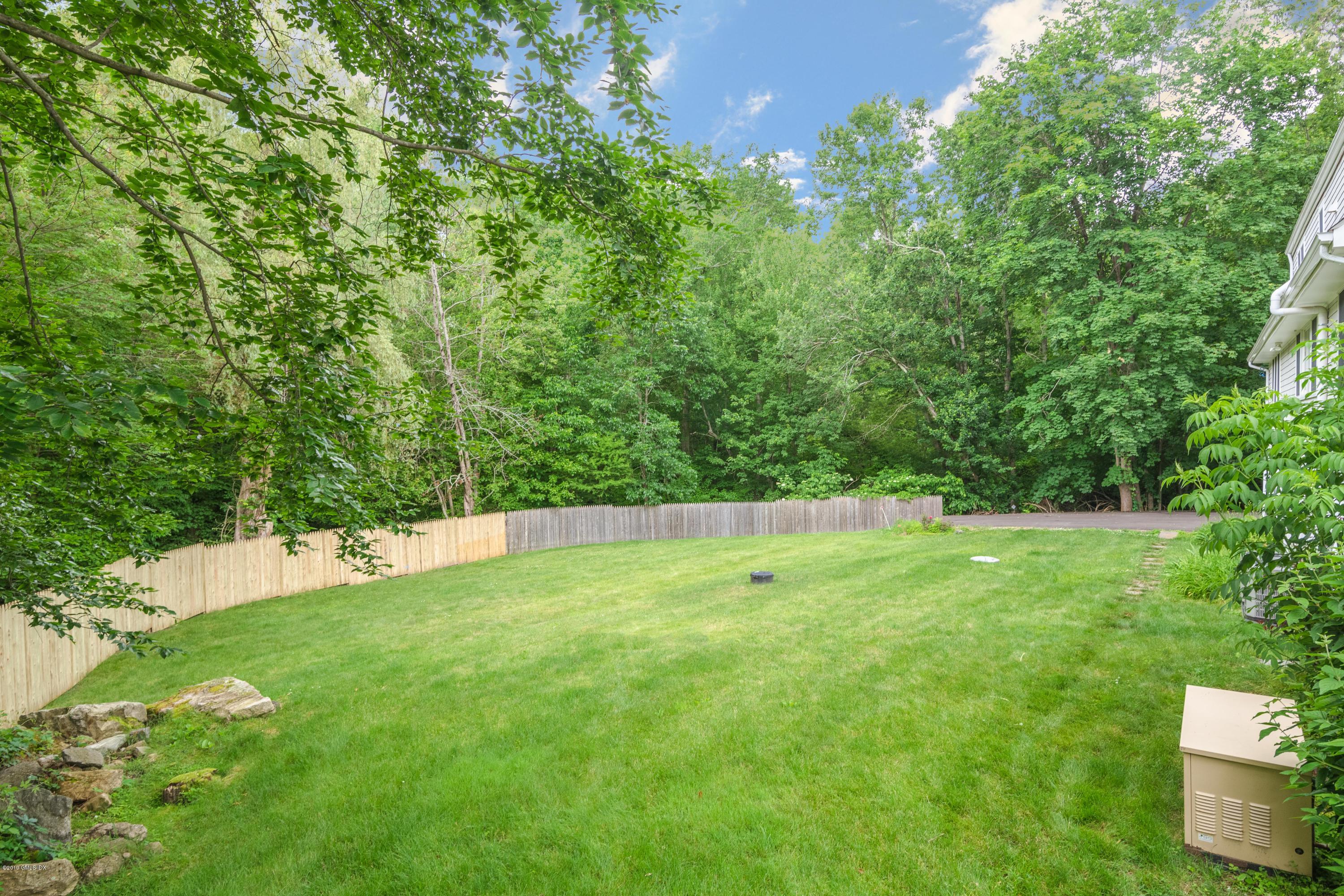94 Cognewaugh Road Cos Cob, CT 06807 - Photo 25 of 25 a view of an outdoor space and a yard