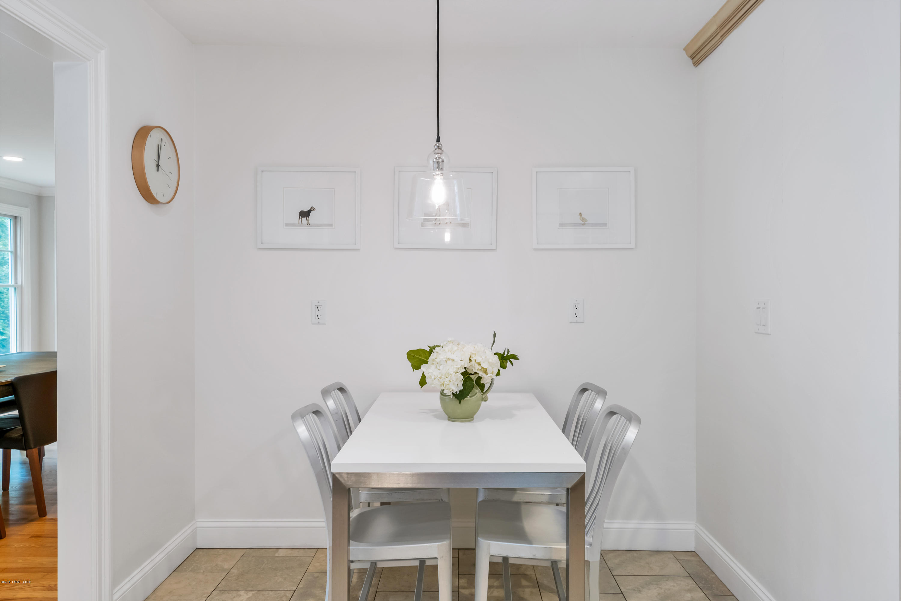 94 Cognewaugh Road Cos Cob, CT 06807 - Photo 6 of 25 a view of a dining room with furniture