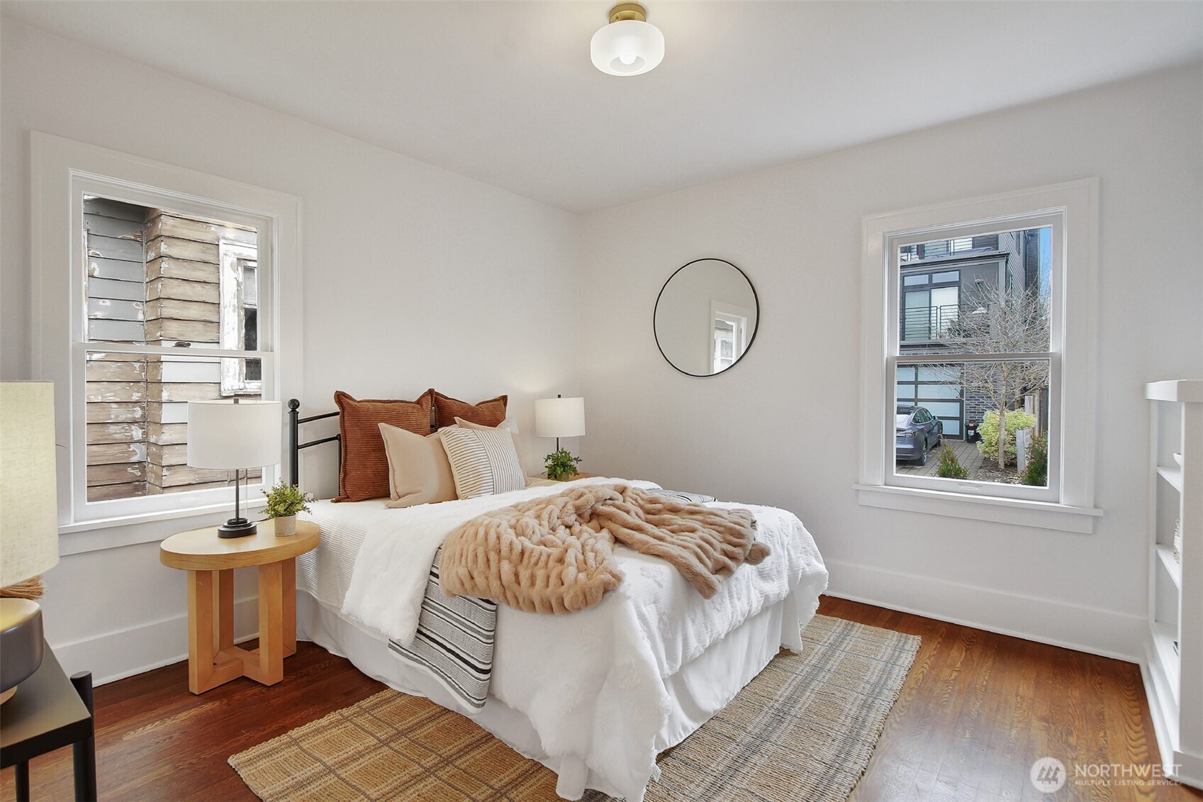 720 North 46th Street Seattle, WA 98103 - Photo 23 of 32 a bedroom with bed and a window