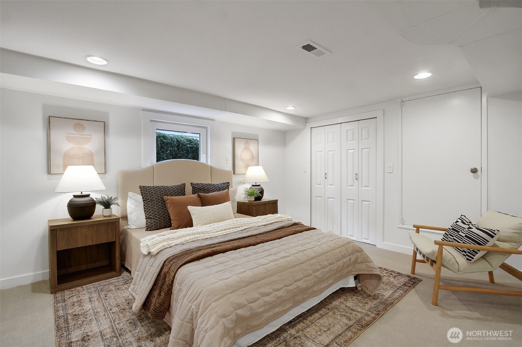 720 North 46th Street Seattle, WA 98103 - Photo 26 of 32 a bedroom with bed and window