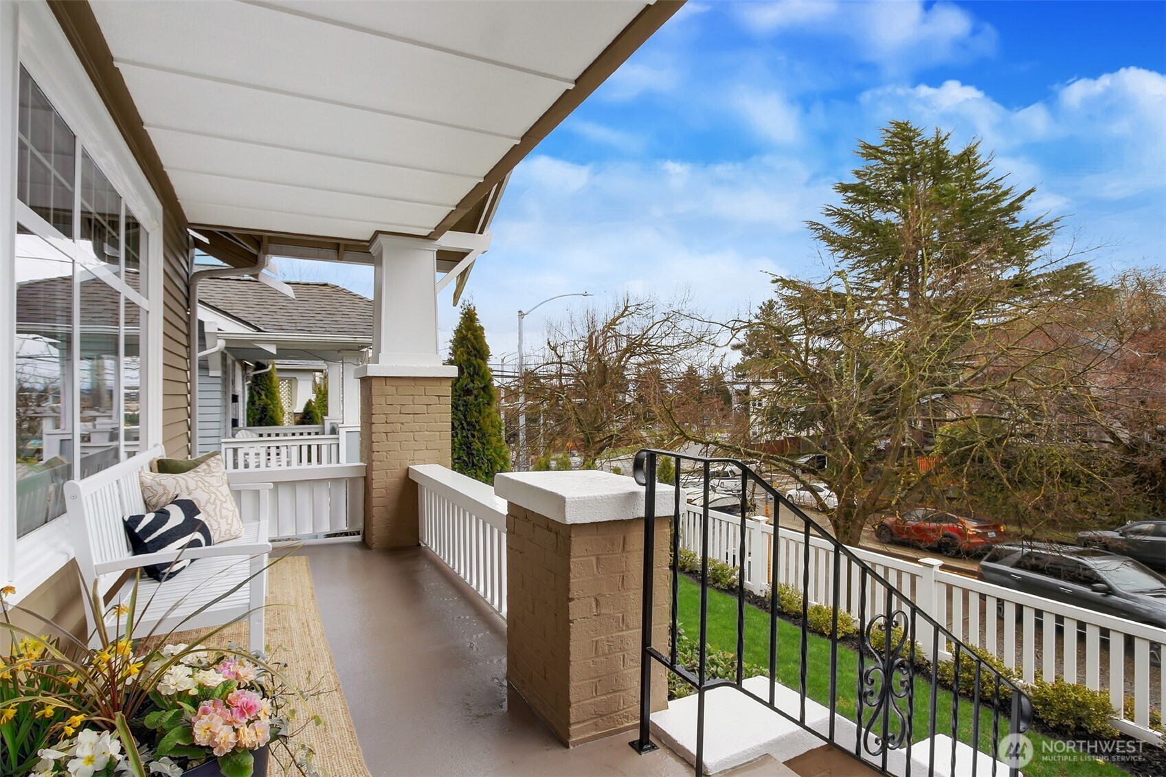 720 North 46th Street Seattle, WA 98103 - Photo 3 of 32 a view of a porch with furniture