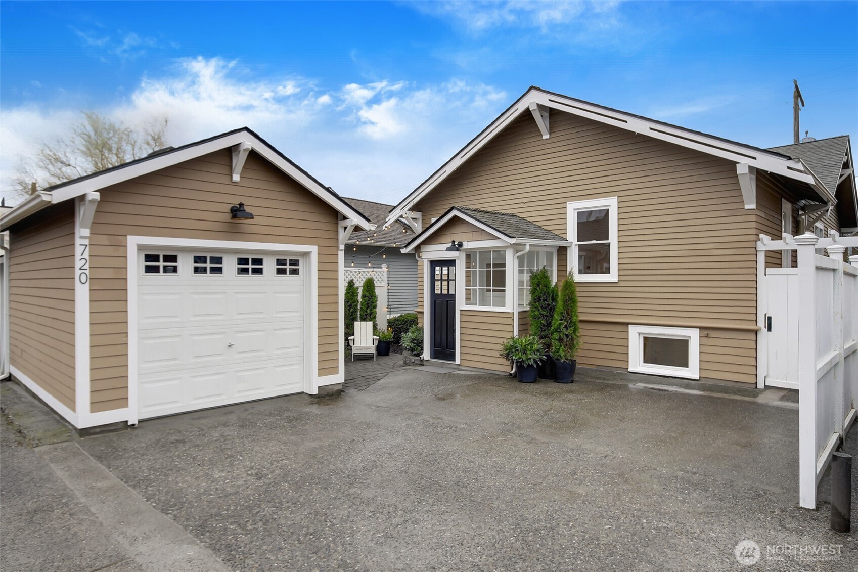 720 North 46th Street Seattle, WA 98103 - Photo 32 of 32 a view of a house with a yard
