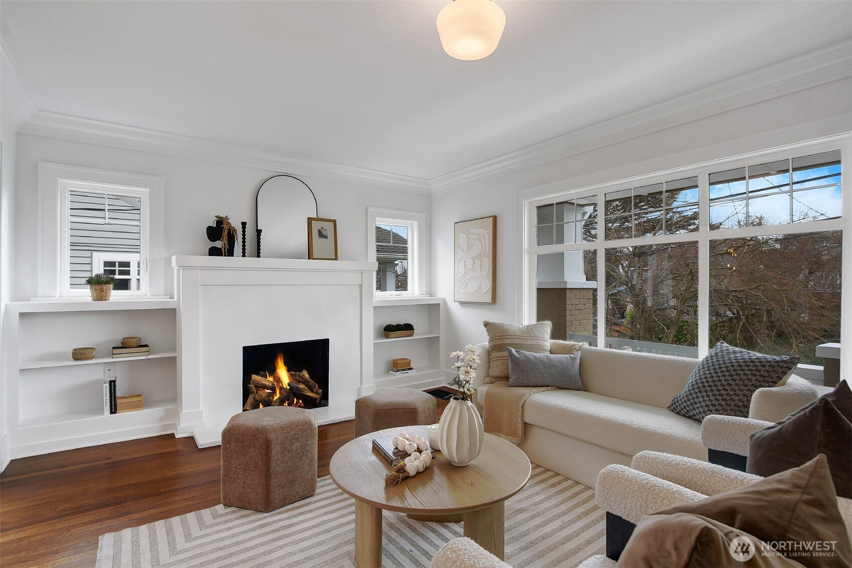 720 North 46th Street Seattle, WA 98103 - Photo 6 of 32 a living room with furniture and a fireplace