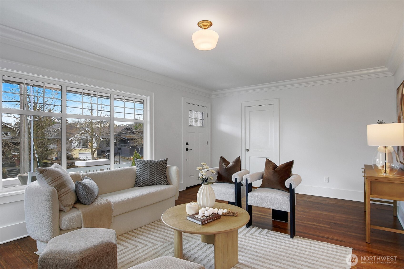 720 North 46th Street Seattle, WA 98103 - Photo 7 of 32 a living room with furniture and a window