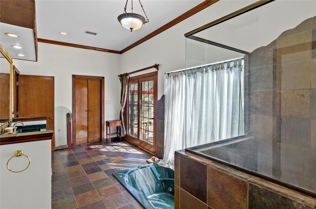 1400 East Shady Grove Road Irving, TX 75060 - Photo 16 of 39 a living room with stainless steel appliances furniture a rug and a window