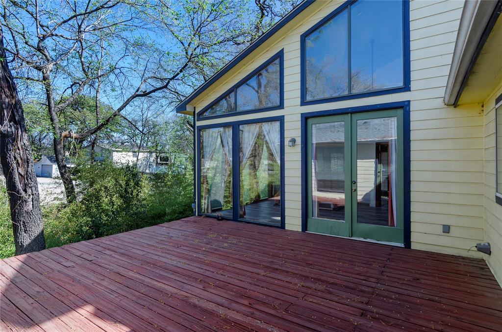 1400 East Shady Grove Road Irving, TX 75060 - Photo 32 of 39 a backyard of a house with wooden floor