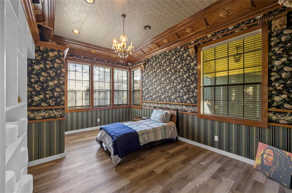 1400 East Shady Grove Road Irving, TX 75060 - Photo 33 of 39 a spacious bedroom with a bed and a window