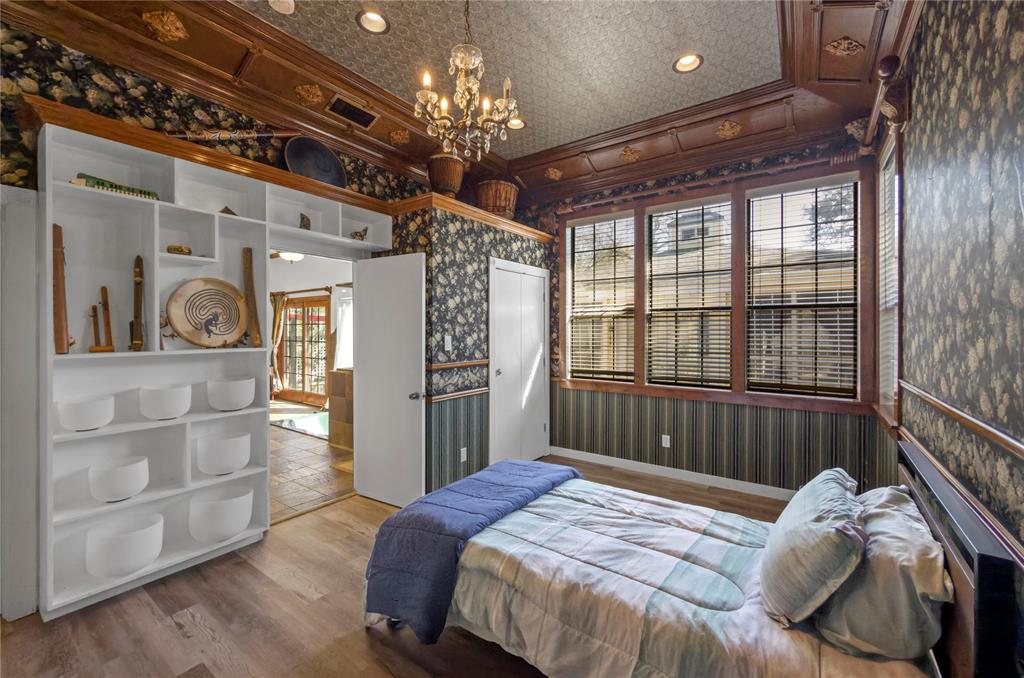 1400 East Shady Grove Road Irving, TX 75060 - Photo 34 of 39 a bed room with a bed and a window